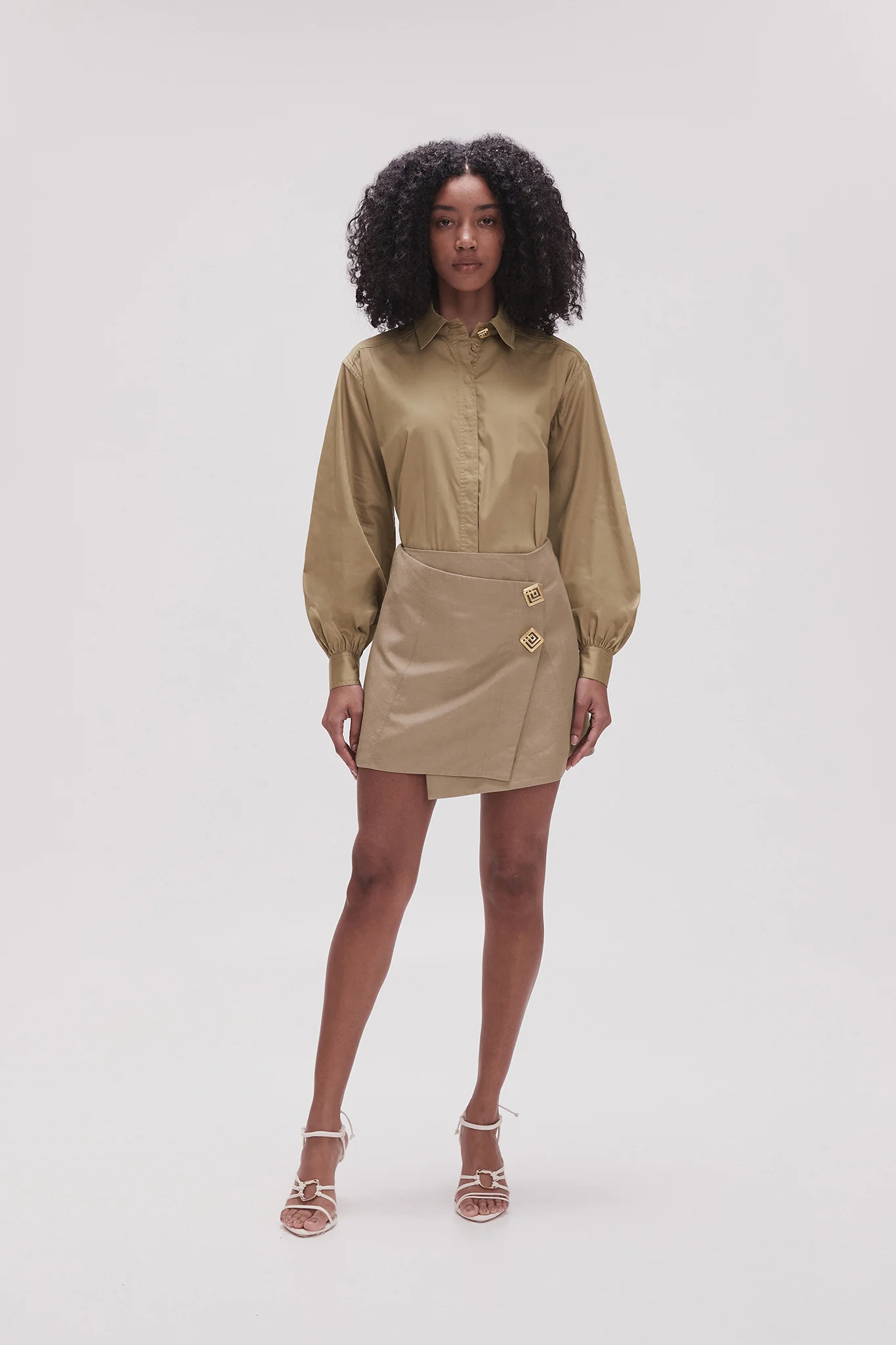 11869-realm-wrap-front-mini-skirt-1.webp Realm Wrap Front Mini Skirt