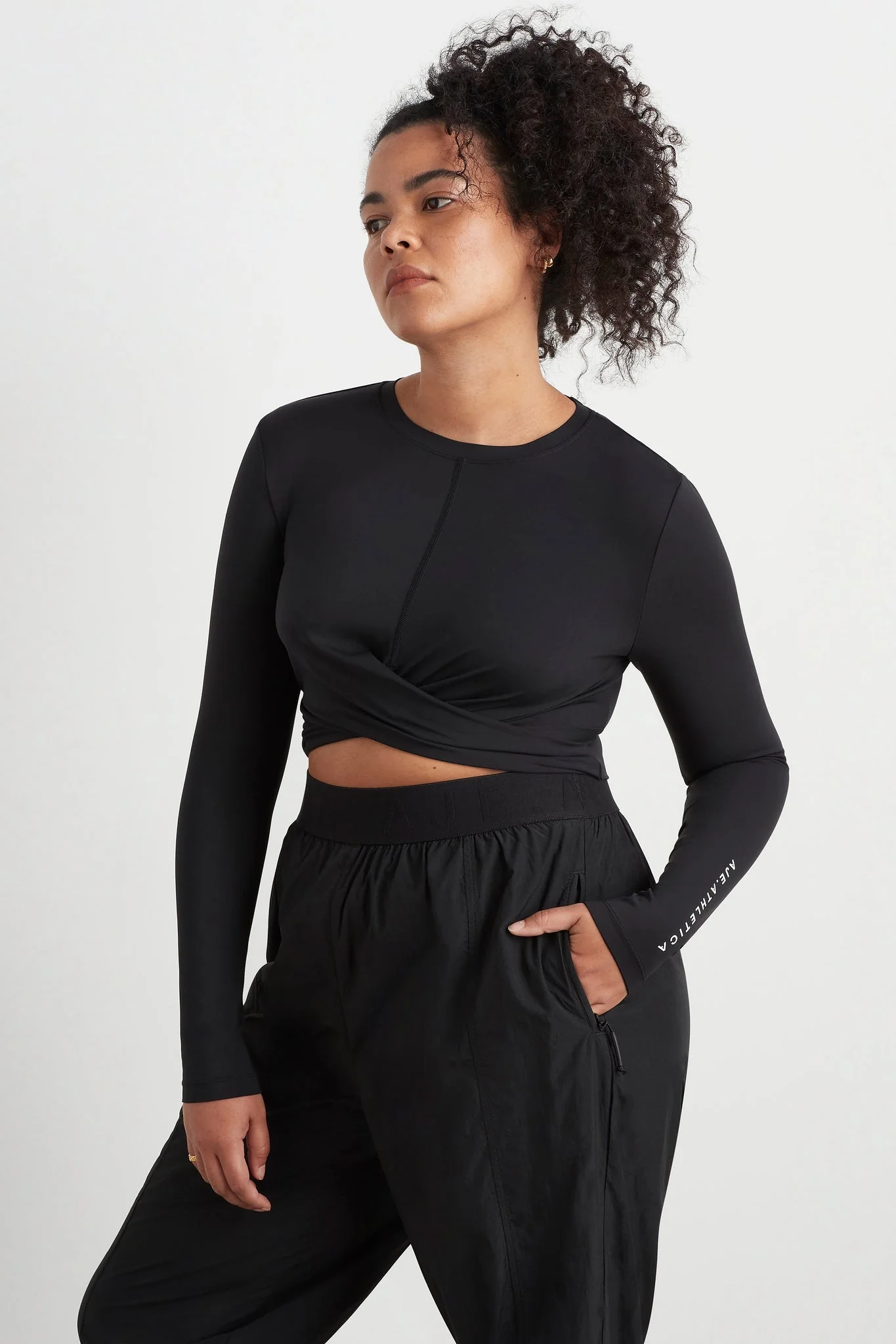 15888-twist-front-long-sleeve-crop-top-328-11.webp Twist Front Long Sleeve Crop Top 328
