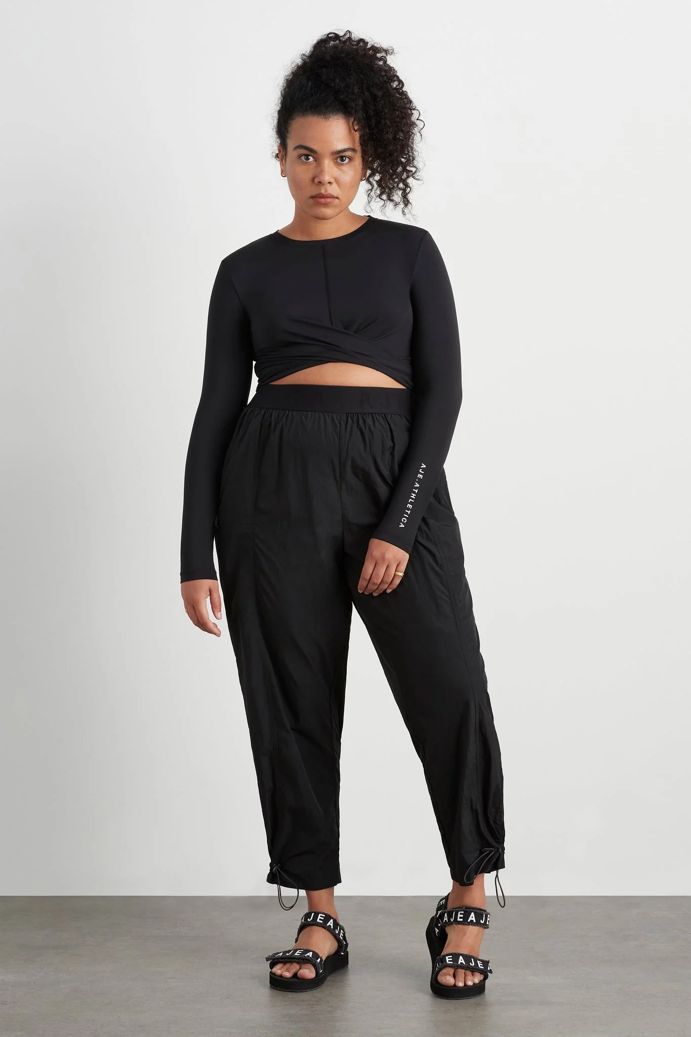 15888-twist-front-long-sleeve-crop-top-328-12.webp Twist Front Long Sleeve Crop Top 328