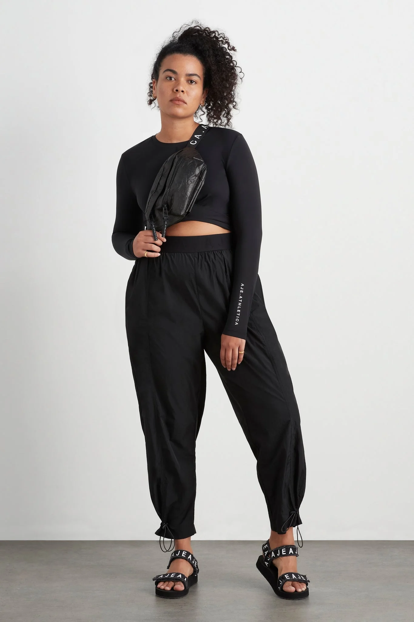 15888-twist-front-long-sleeve-crop-top-328-15.webp Twist Front Long Sleeve Crop Top 328