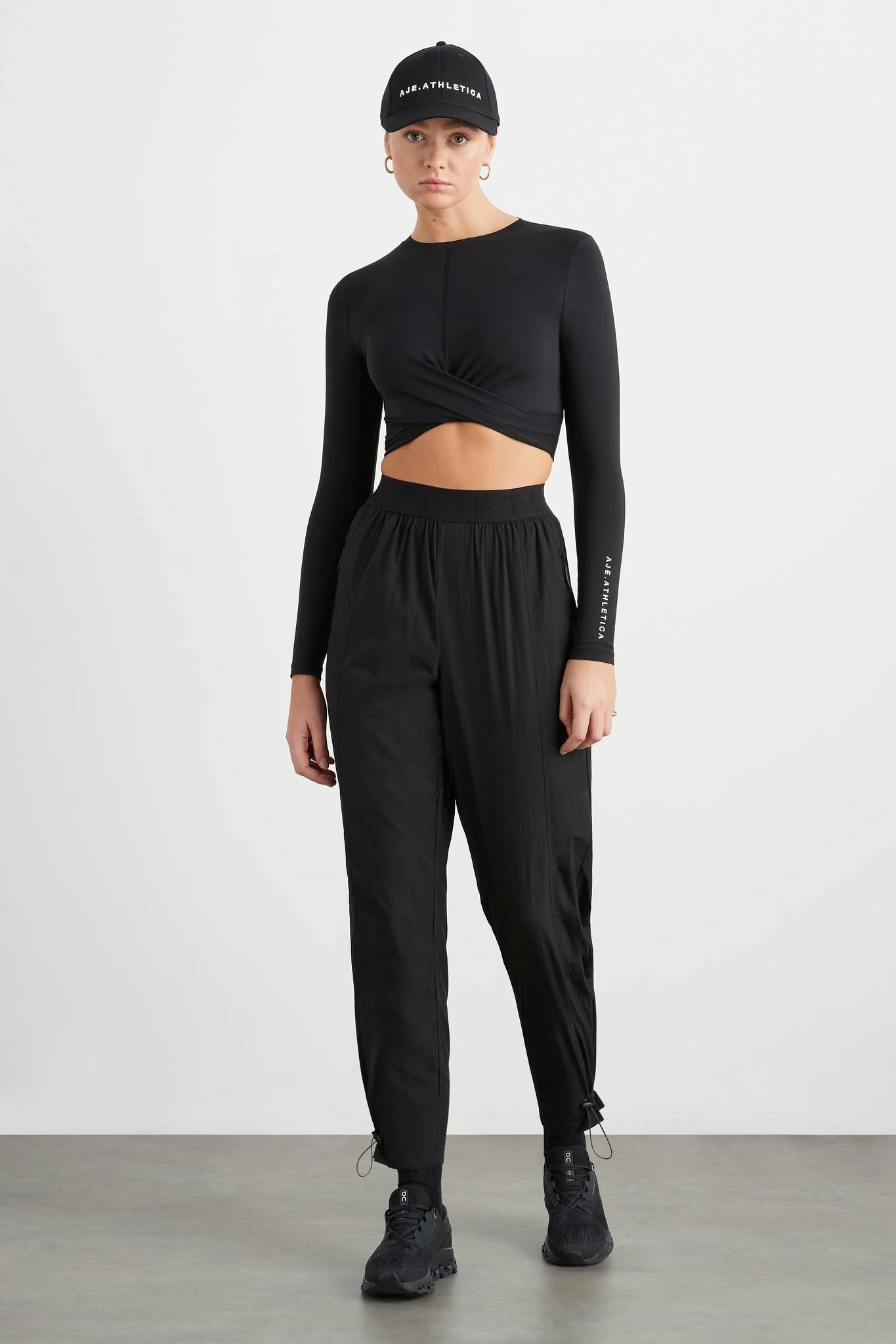 15888-twist-front-long-sleeve-crop-top-328-3.webp Twist Front Long Sleeve Crop Top 328