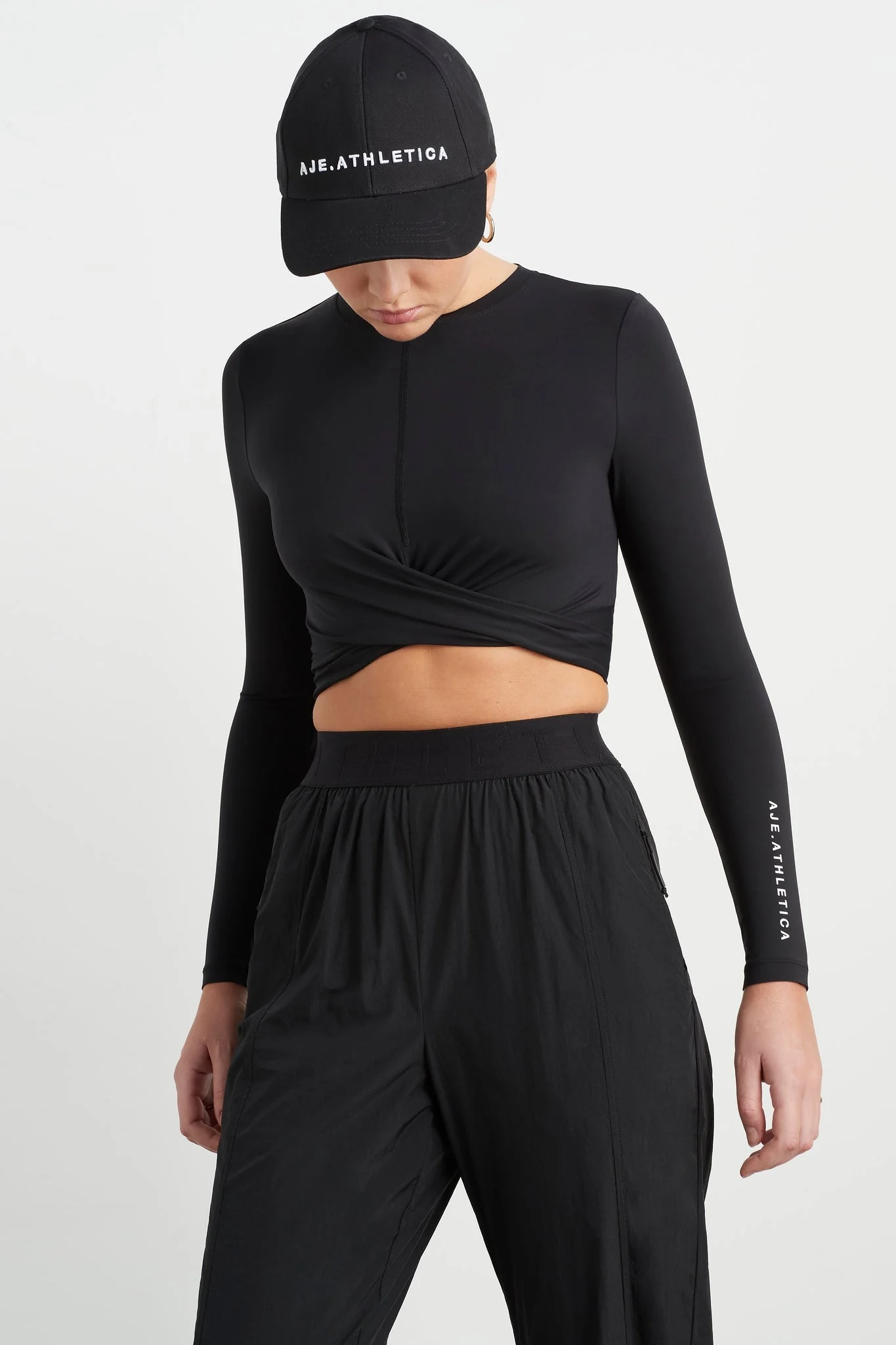 15888-twist-front-long-sleeve-crop-top-328-5.webp Twist Front Long Sleeve Crop Top 328