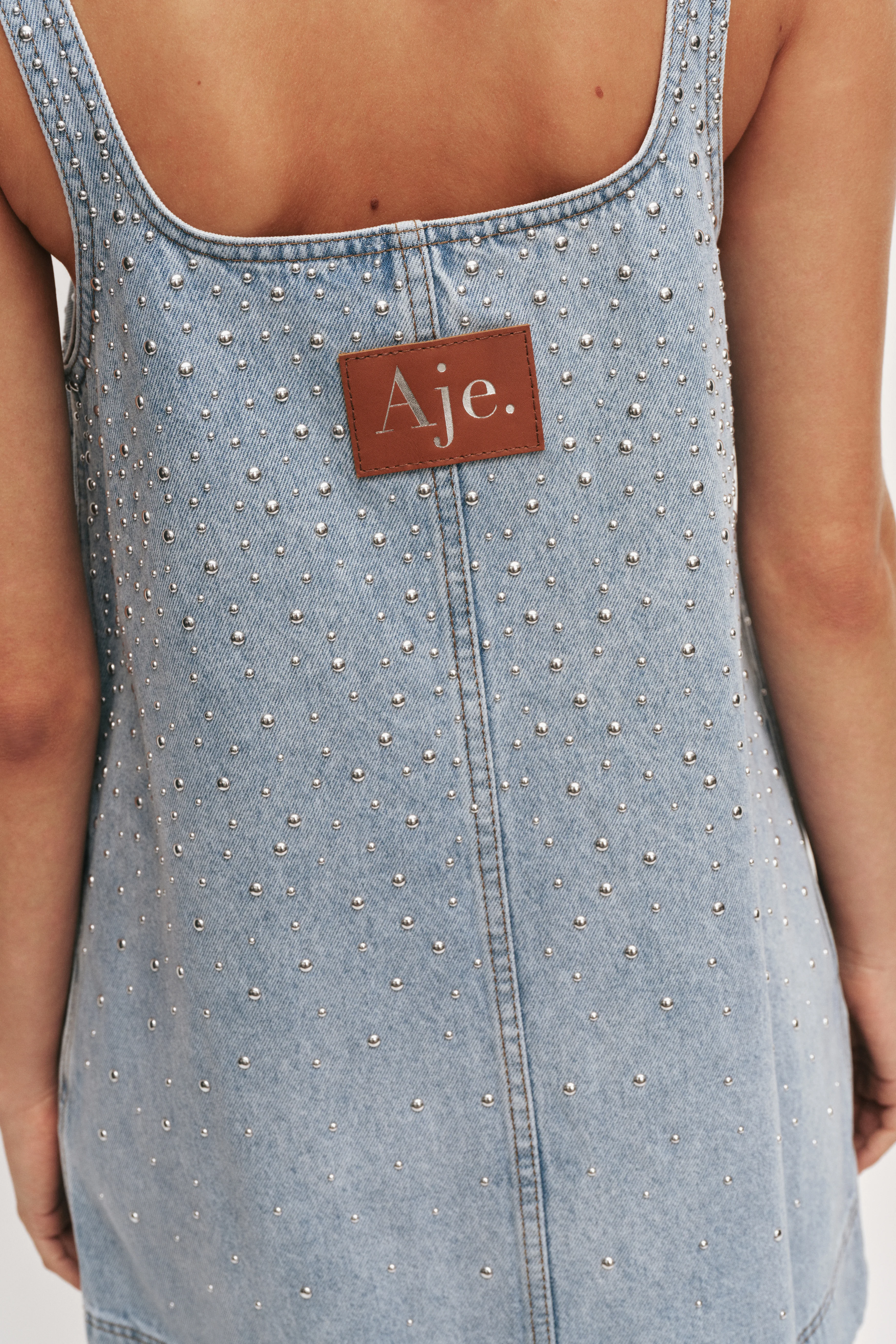 17444-lucina-stud-denim-mini-dress-5.webp Lucina Stud Denim Mini Dress