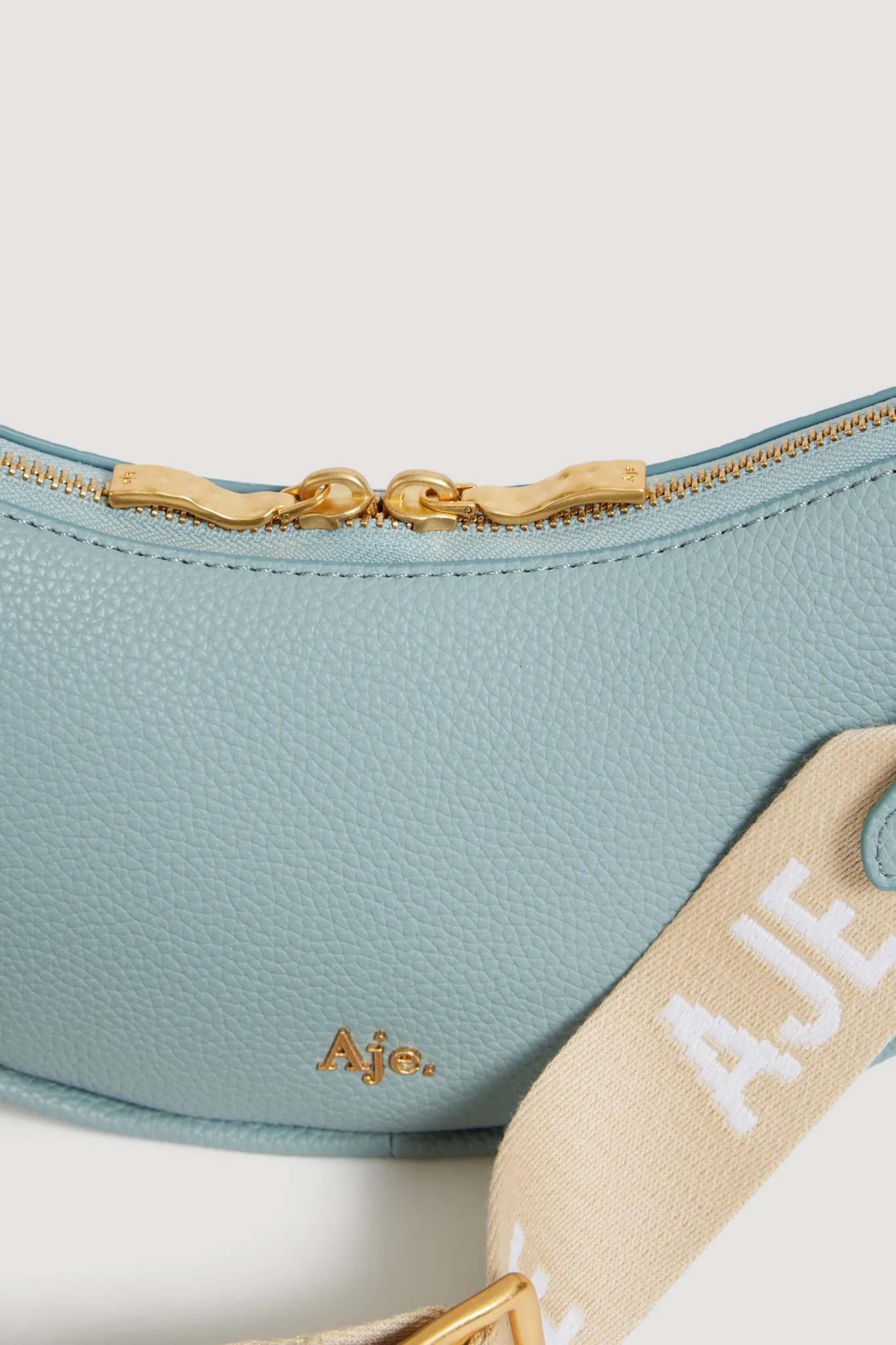 Astouri Sling Crossbody