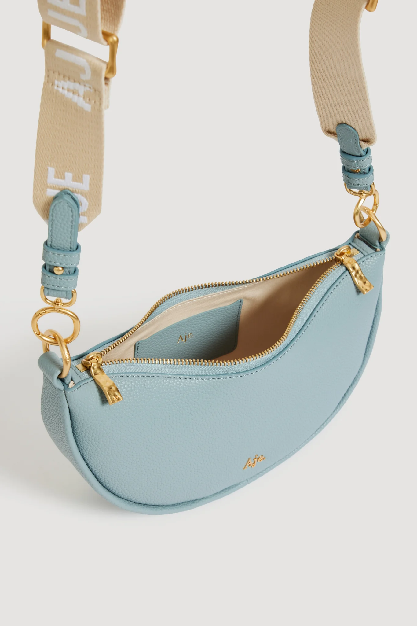 Astouri Sling Crossbody