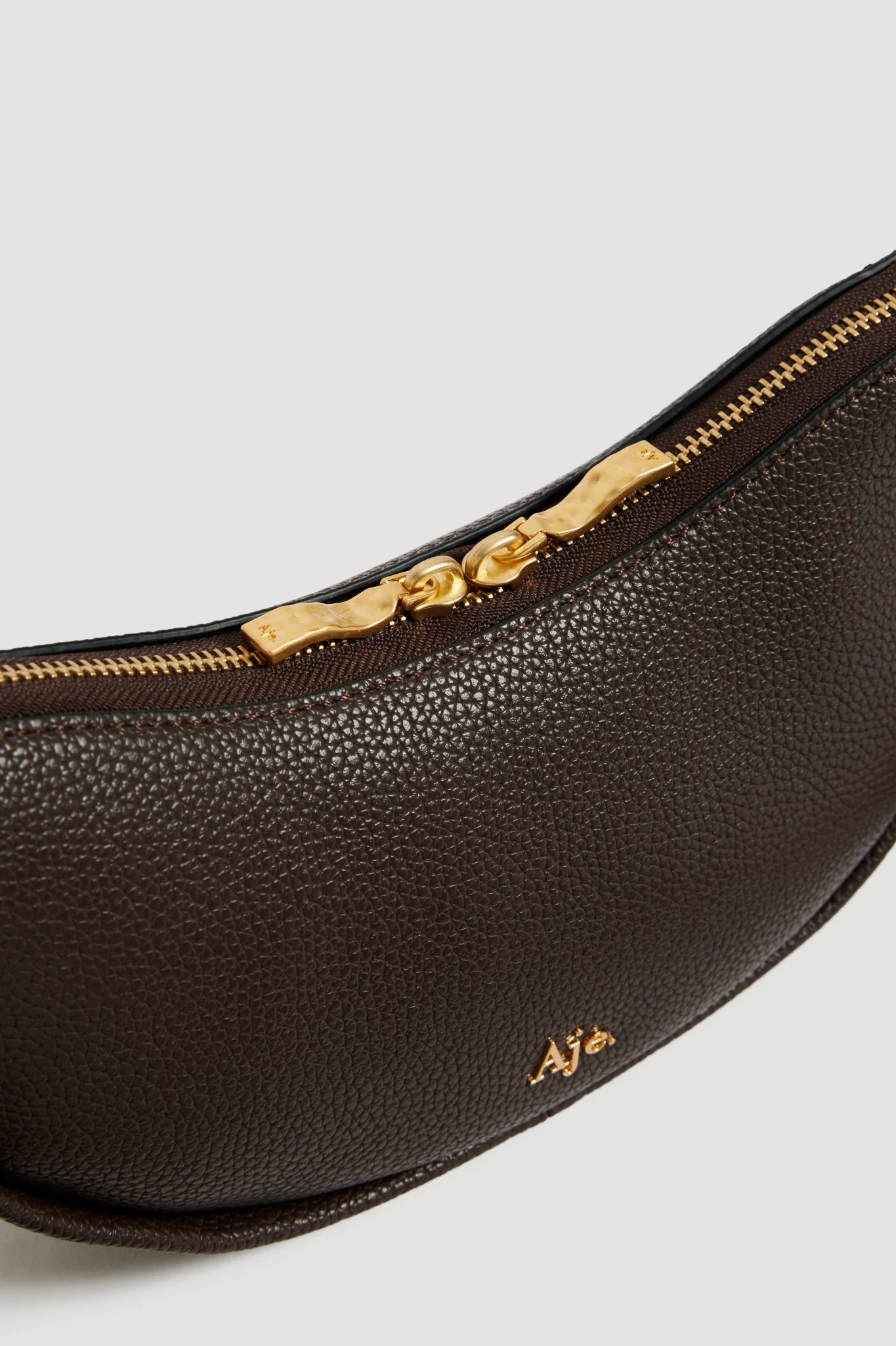 Astouri Sling Crossbody
