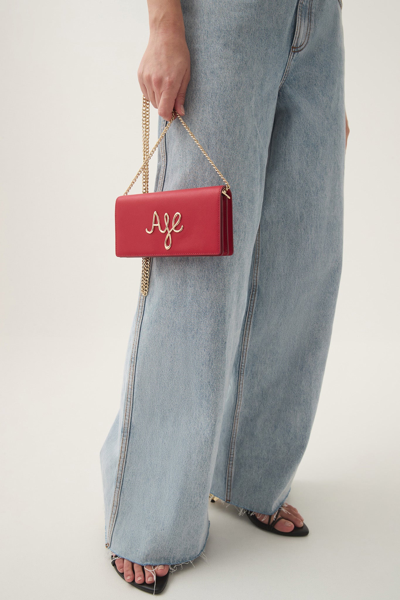 7285-joni-logo-chain-clutch-3.jpg Joni Logo Chain Clutch